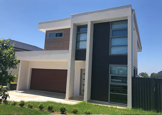 กรอบเหล็กแบบเย็น Prefab บ้านเดี่ยวขนาดเบาเหล็กอาคารที่ทันสมัยสําหรับการอาศัย